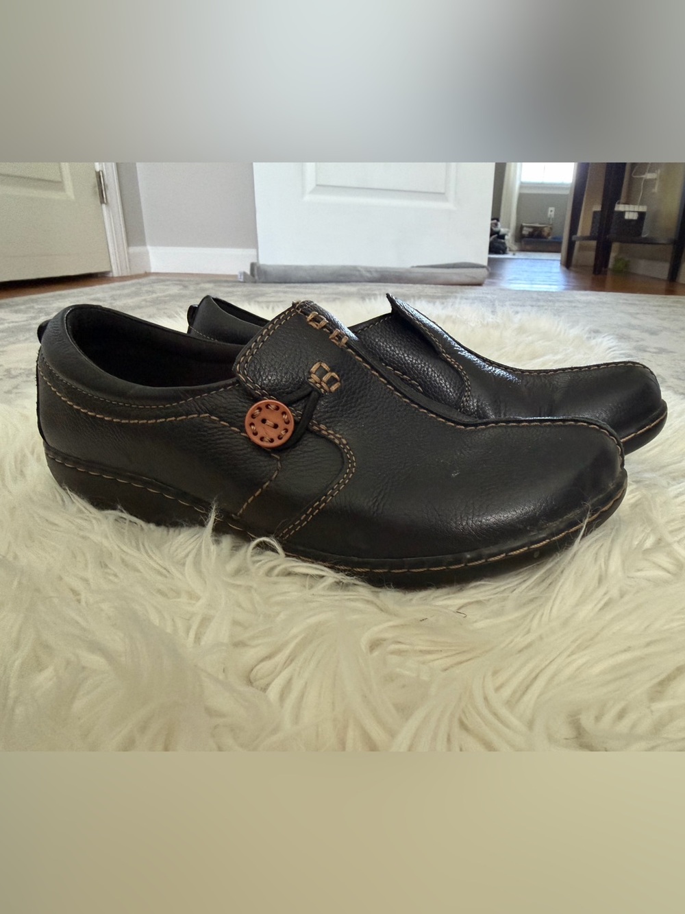 CLARKS Women’s Black Leather Slip-On Loafers with Contrast Stitching